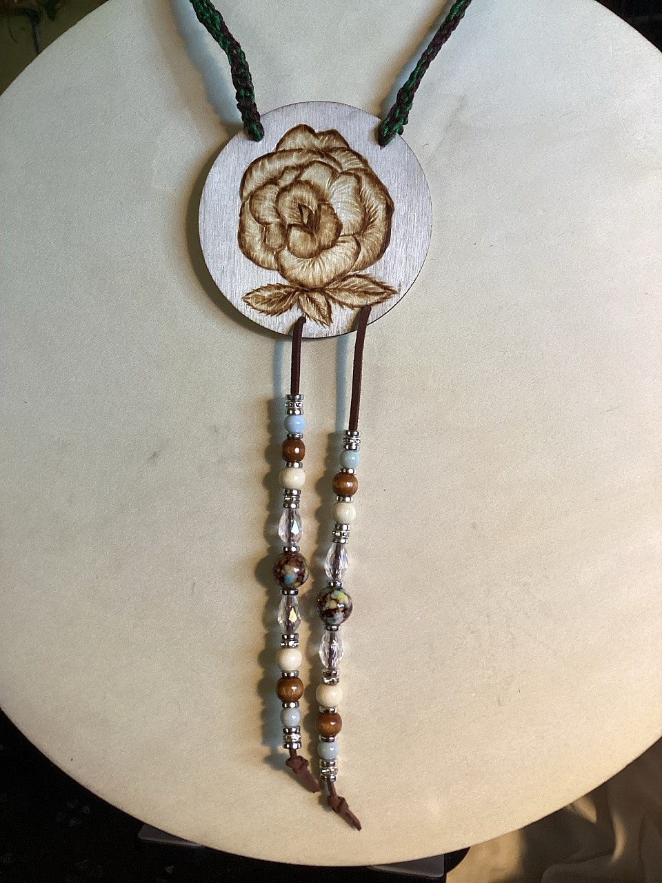 Wood rose $10